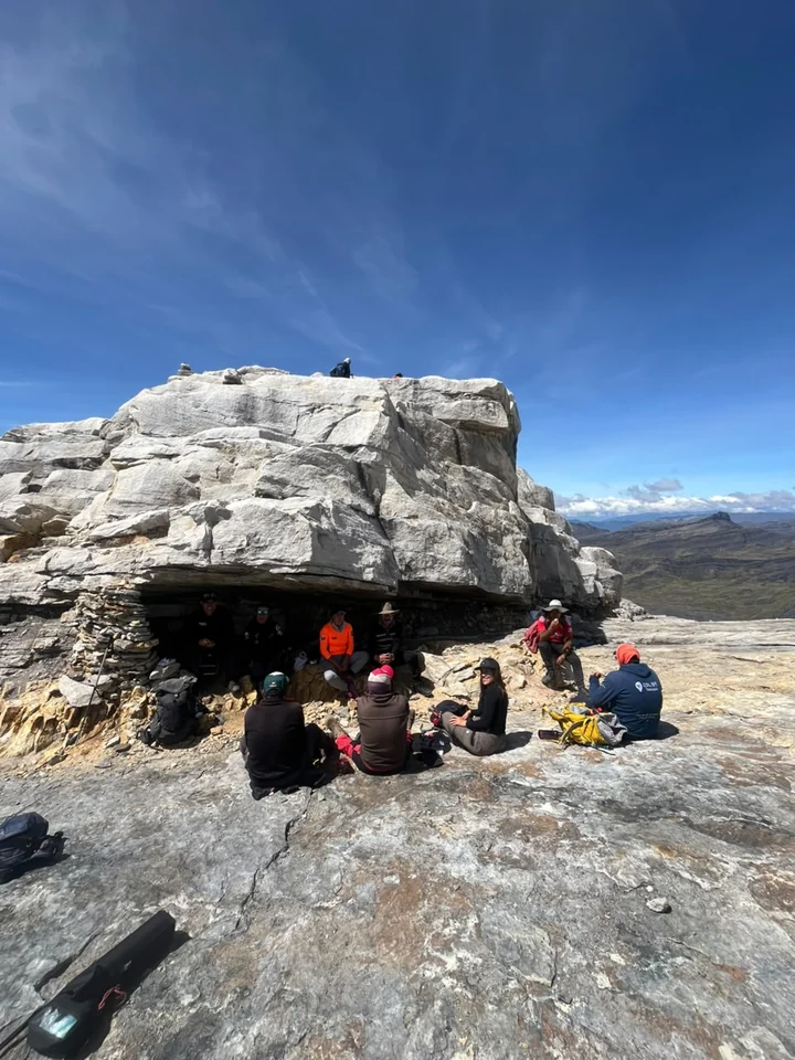 A group resting at the Divino Niño, the highest accessible point on the Ritacuba Blanco trail